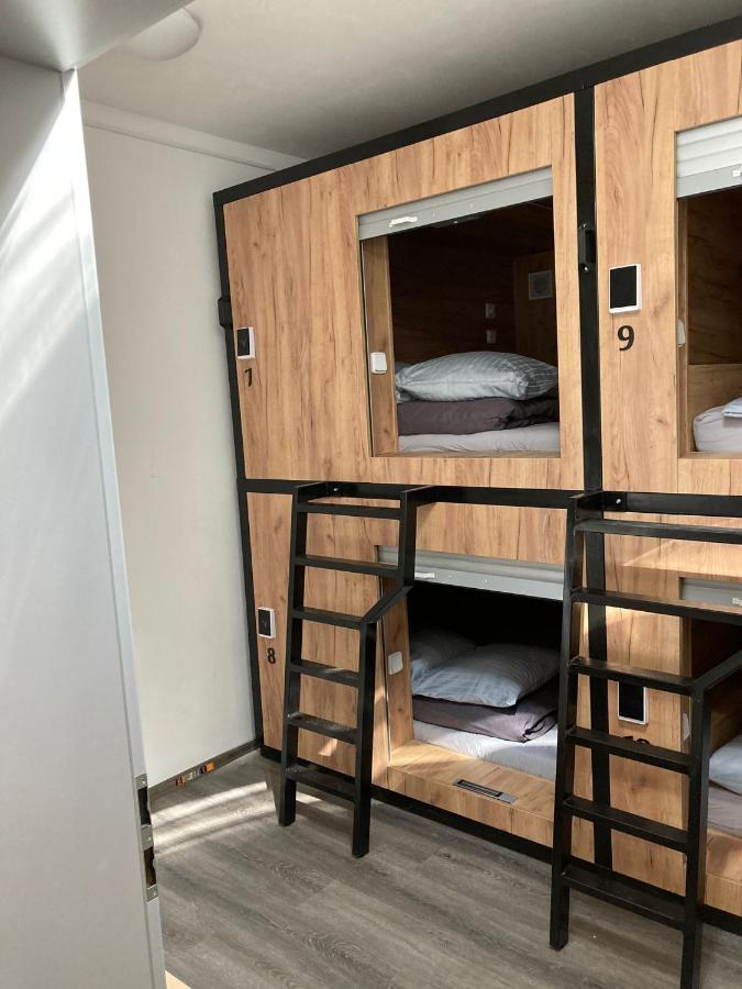 Capsule Hostel Erbenova Прага Экстерьер фото